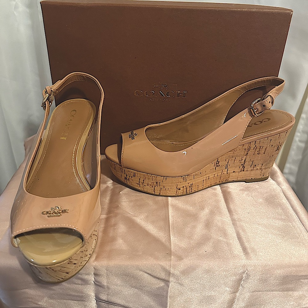 Coach platform wedge ladies size 7. Color-pinkish/tan.